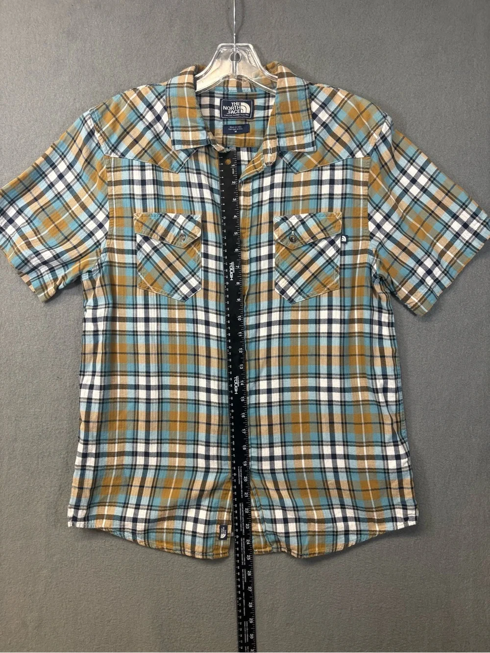 The North Face Men’s cotton multicolor plaid short-sleeve button-up shirt Sz. M